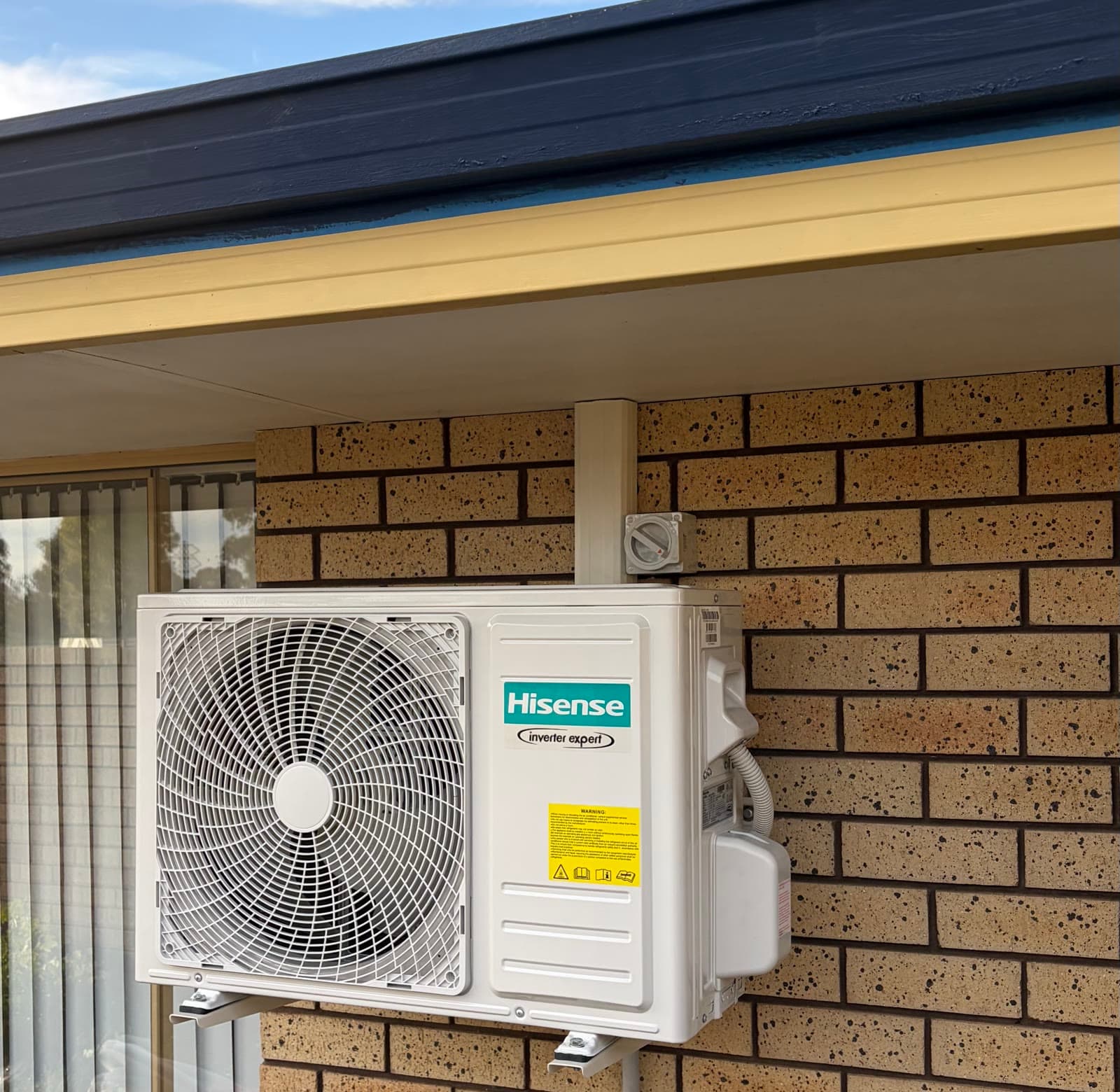 A split system outdoor unit on a wall bracket, our previous work