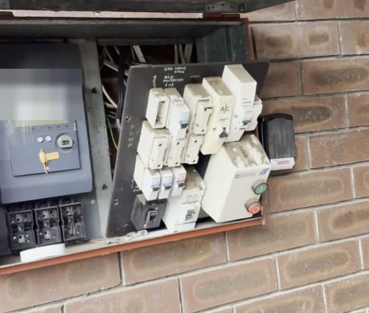 An old fuse board with ceramic fuses, before our upgrade